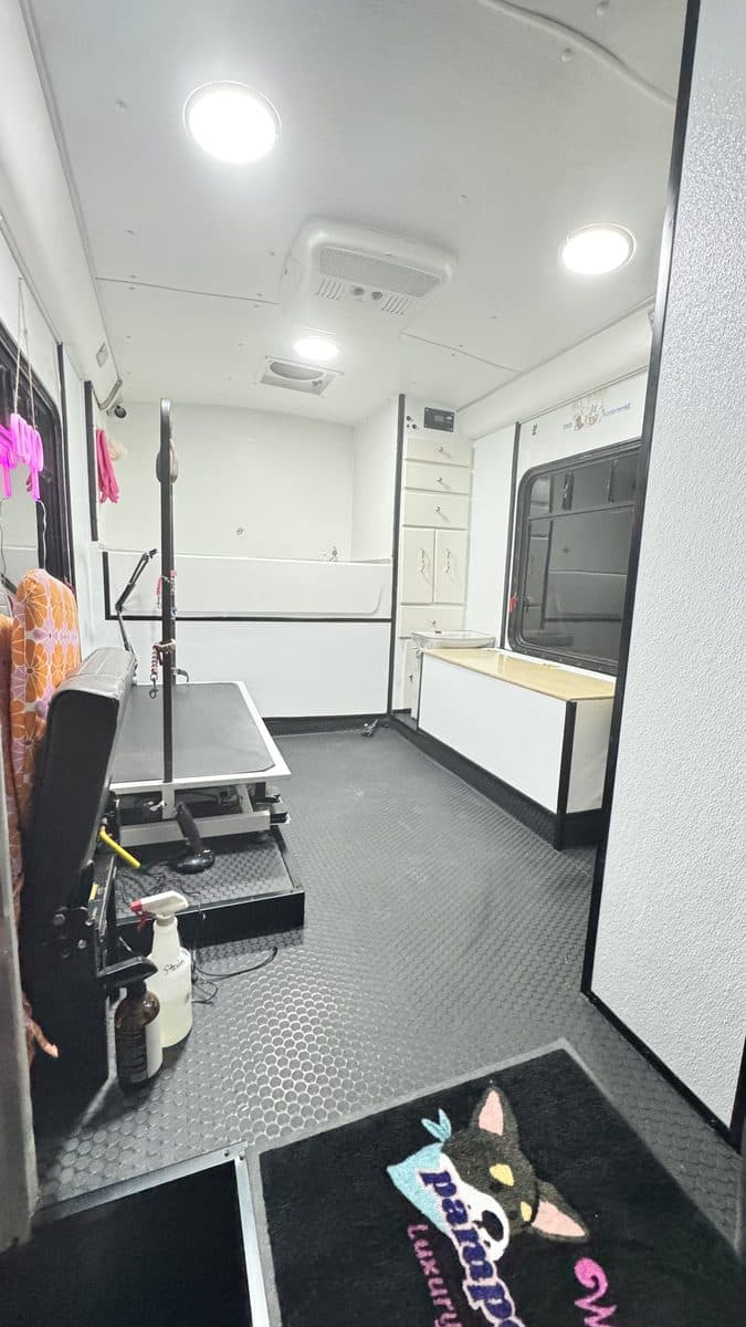 Inside the Pampered Puppies At Your Door mobile grooming unit, serving Barstow and the High Desert